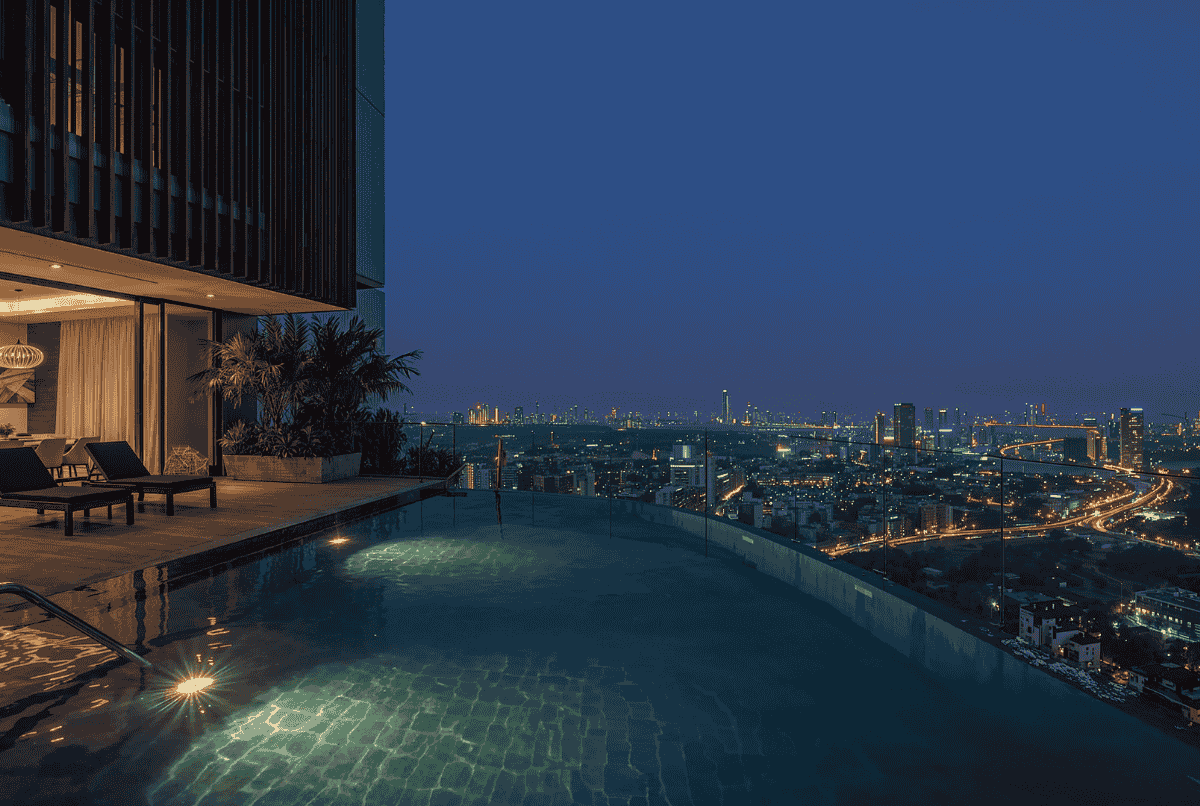 Kolam renang infinity Gaia Hotel Bandung dengan latar pegunungan dan langit pagi